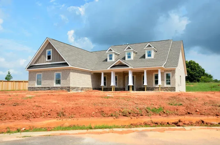 New construction home under framing with windows installed Springfield MO